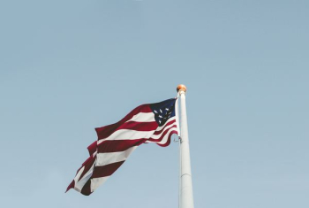 U.S.A flag under blue sky U.S.A flag under blue sky