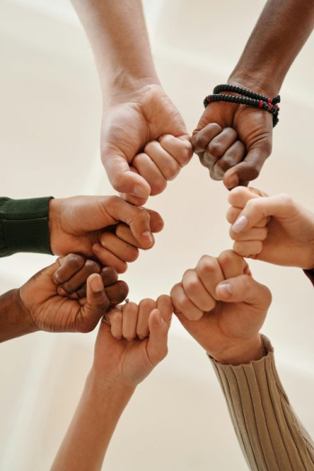 Unity in Diversity: Hands Coming Together in a Circular Motion Unity in Diversity: Hands Coming Together in a Circular Motion
