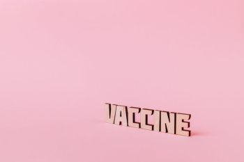 Vaccine Text on Pink Background Vaccine Text on Pink Background