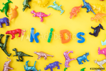 Various animal toy figures background with the word kids Various animal toy figures background with the word kids