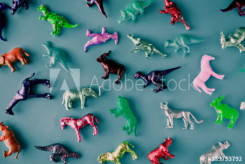 Various animal toy figures in a colorful background Various animal toy figures in a colorful background