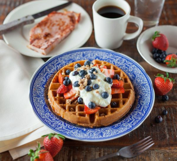 waffle pancake on blue ceramic plate waffle pancake on blue ceramic plate