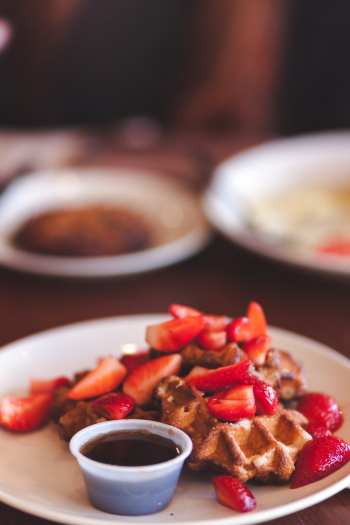 Waffle With Sliced Strawberries On A Plate Waffle With Sliced Strawberries On A Plate