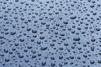 Water Droplets on Blue Surface Water Droplets on Blue Surface