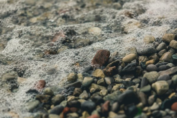 Water On Rocky Beach