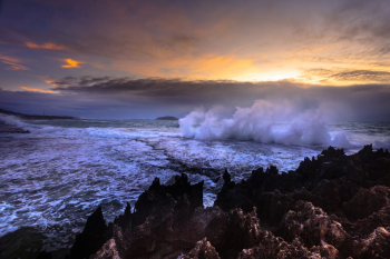 Water Waves Splashing on Rocks Water Waves Splashing on Rocks