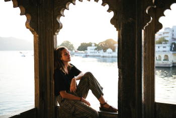 Western woman sitting on a cultural architect.. | Free stock photo - 543714 Western woman sitting on a cultural architect.. | Free stock photo - 543714