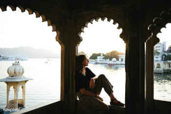 Western woman sitting on a cultural architect.. | Free stock photo - 543722 Western woman sitting on a cultural architect.. | Free stock photo - 543722