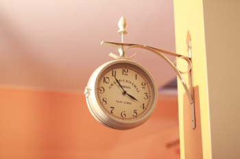 White Analog Clock Displaying 3:54 White Analog Clock Displaying 3:54