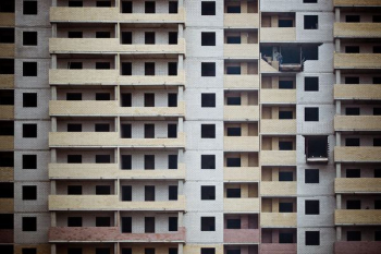 white and brown concrete apartment white and brown concrete apartment