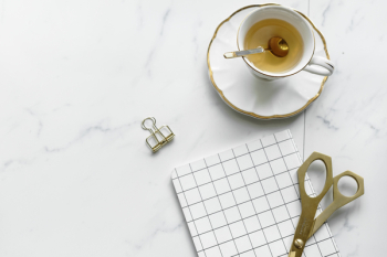 White and Gold-colored Teacup