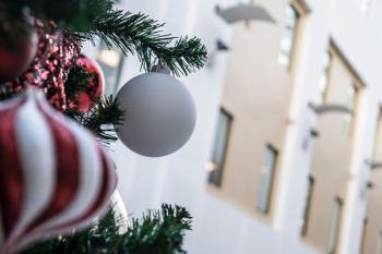 white bauble on Christmas tree white bauble on Christmas tree