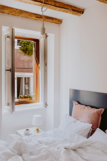 White bedroom interior with window White bedroom interior with window