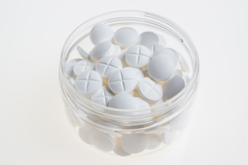 White Capsules in Jar White Capsules in Jar