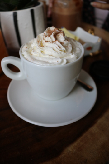 White Ceramic Cup With White Cream White Ceramic Cup With White Cream