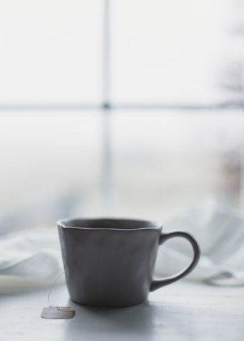 white ceramic teacup white ceramic teacup
