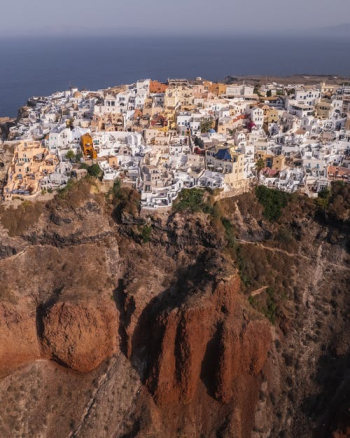 White Concrete Houses on Brown Rocky Mountain · Free Stock Photo White Concrete Houses on Brown Rocky Mountain · Free Stock Photo