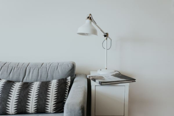 white desk lamp near gray fabric couch white desk lamp near gray fabric couch