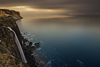 White Fabric Hanging on a Cliff