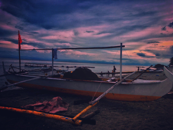 White Fishing Boat during Dawn White Fishing Boat during Dawn