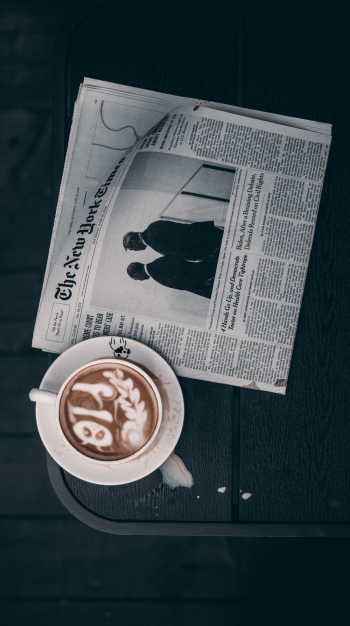 White Newspaper Beside Teacup White Newspaper Beside Teacup