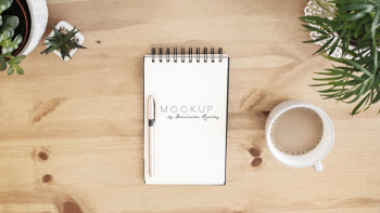White Notebook Beside Coffee Cup White Notebook Beside Coffee Cup