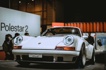 White Porsche 911 Coupe In A Car Show White Porsche 911 Coupe In A Car Show
