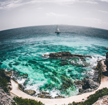 White Sailboat on Sea Water Fish-eye Photo White Sailboat on Sea Water Fish-eye Photo