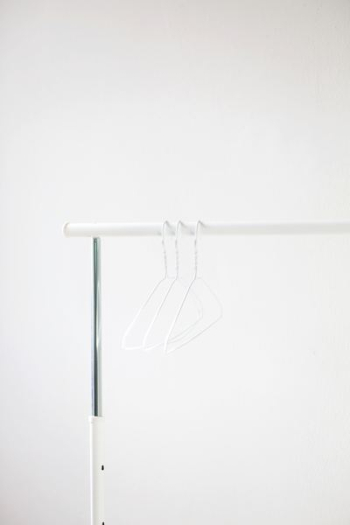 white steel cloth hangers on rack white steel cloth hangers on rack