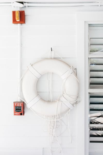 white swim ring beside window white swim ring beside window