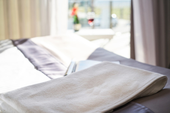 White Towel on Bed White Towel on Bed