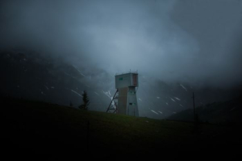 white watch tower on mountain white watch tower on mountain