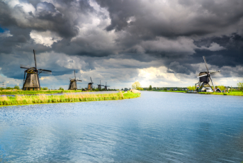 Wind Mills Near Body of Water Wind Mills Near Body of Water