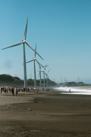 Wind Mills Near the Body of Water Wind Mills Near the Body of Water