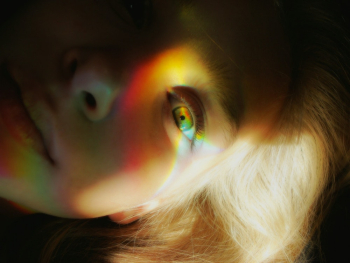 Woman's Face With Light Reflections Woman's Face With Light Reflections