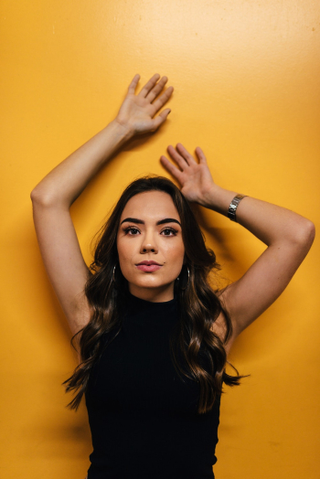 Woman Against Yellow Wall Woman Against Yellow Wall