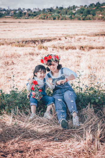 Woman and Child on Grass Woman and Child on Grass