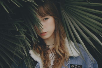 Woman Behind Plant Woman Behind Plant