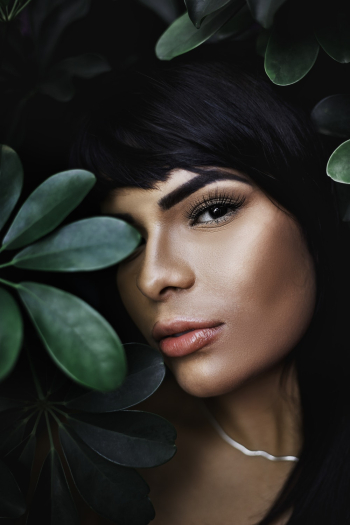 Woman Behind Plant Woman Behind Plant