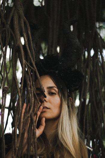 Woman Behind Plant Woman Behind Plant