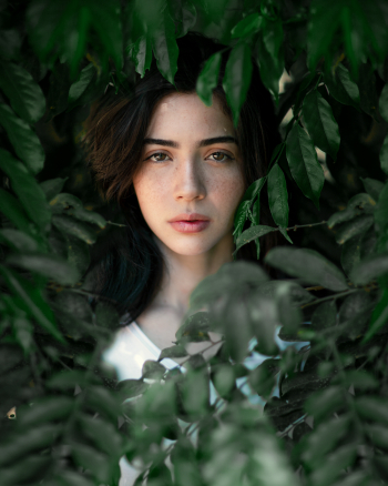 Woman Behind Plants Woman Behind Plants