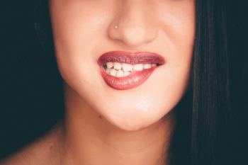 Woman Biting Red Lips With Nose Pin Woman Biting Red Lips With Nose Pin