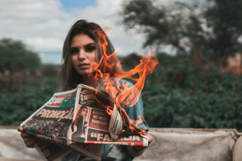Woman Burning Newspaper Woman Burning Newspaper