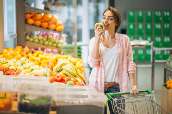 Woman buying at grocery store Free Photo Woman buying at grocery store Free Photo