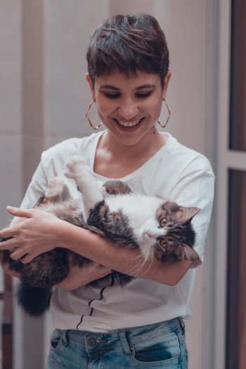 Woman Carrying Cat Woman Carrying Cat