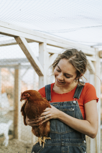 Woman Carrying Hen Woman Carrying Hen