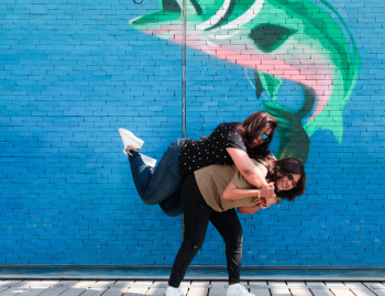 Woman Carrying Her Friend Woman Carrying Her Friend