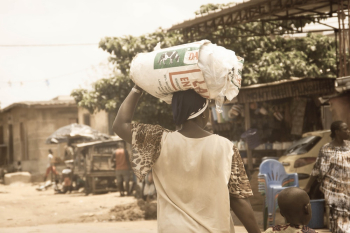Woman Carrying Sack Woman Carrying Sack