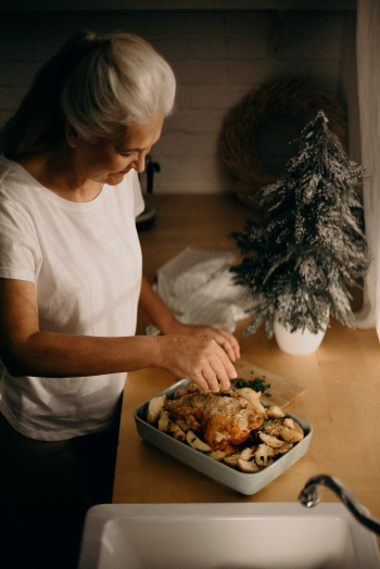 Woman Cooking Chicken Woman Cooking Chicken