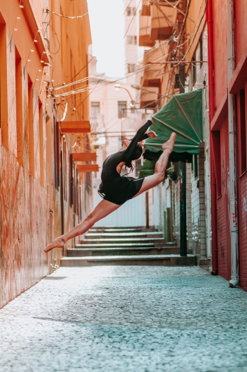 Woman Doing Ballet Dance in Pathway Woman Doing Ballet Dance in Pathway